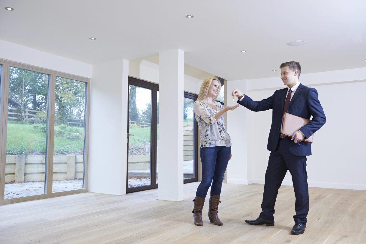 Realtor Giving Keys to New Owner